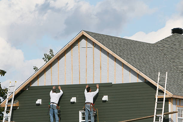 Professional Siding Installation technician working in Dorchester, MA
